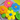 Close up of the Blooming Garden Cupcake Cake showing piped buttercream blossoms in pink, orange, yellow and blue