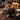 Chocolate Decorated Bundt Cake with chocolate glaze and piped frosting swirls on a cake stand