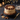 Chocolate Reese's Peanut Butter Cake with peanut butter frosting and Reese's cups around the top