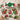 Overhead flat lay of a personalized Christmas candy gift box with character candy bags on a cream knit blanket