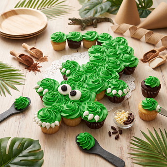 Crocodile Cupcake Cake: pull-apart cupcakes piped in green buttercream as a smiling crocodile