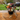 Fire Up the Grill gift bucket with grilling tools on a backyard table | Boston Gift Baskets