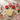 Flower Pot Cupcake Cake: 46 mini cupcakes piped as a white flower pot with pink buttercream blossoms and green leaves