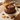 German Chocolate Cake: chocolate layer cake topped with toasted coconut-pecan filling