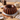 Marble Bundt Cake on a cake stand with coffee