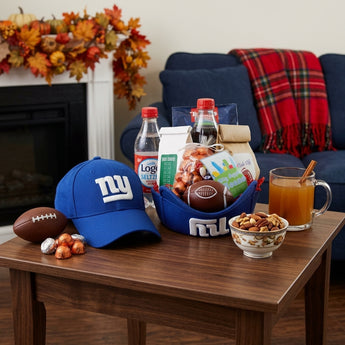 New York Giants Gift, a Giants cap with chocolate footballs, Big Apple Beans, Coca-Cola, mixed nuts and coffee, on a side table by the sofa