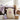 Natural canvas drawstring laundry bag with a purple script monogram, standing in a dorm room on move in day with folded towels, laundry detergent and a woven basket
