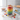 Rainbow layered cupcake jar with vanilla buttercream and rainbow sprinkles, styled on a bright counter with candy