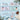 Overhead flat lay of snowman personalized chocolate bars with holiday greetings on a pale blue table