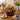 Bake Shoppe Gift Basket, a wicker basket of muffins, cookies, brownies and granola with a blue bow, on a farmhouse brunch table