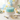 Custom Baby Name Cake: fondant cake with baby booties, stars, moons and a hand-lettered name