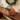 Holiday Cheer gift shown in a plain wicker basket as the alternate container, on a walnut console with brass candlesticks
