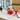 Holiday Crunch Gift Box Regular in an office break room | Boston Gift Baskets