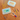 Two Personalized Pencil Boxes, clear plastic cases with printed name labels reading James and Sophie, on a wooden table with pencils, Crayola crayons and markers