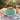 Secret Garden Cake covered edge to edge in hand-piped multicolor buttercream roses