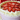 Another view of the Strawberry Delight Cake with vanilla buttercream and a topping of fresh sliced strawberries