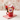 Valentine's Day Mug Gift, a red heart mug filled with a Happy Valentine's Day cookie, chocolate rose and treats, on a striped napkin