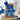 Winter blue snack box with personalized card and blue bow on a living room console