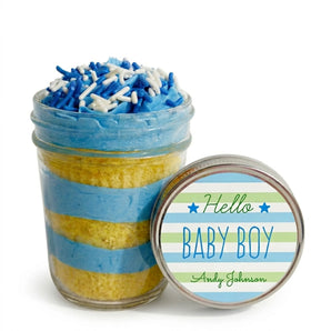 Decorative jar with blue and yellow layers of cupcake dessert and a customizable 'Hello Baby Boy' label.