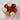 Bouquet of cupcakes decorated like a flower arrangement on a marble background