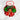 Decorative cupcake with reindeer face and green and red icing on a marble background