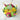Colorful birthday cupcake bouquet with decorative hats and a customizable 'Happy Birthday Julia' sign on a marble background.