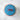 Blue cake with red bow and text on a marble surface