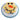 Cupcake decorated like a snowman on a white plate with a white background